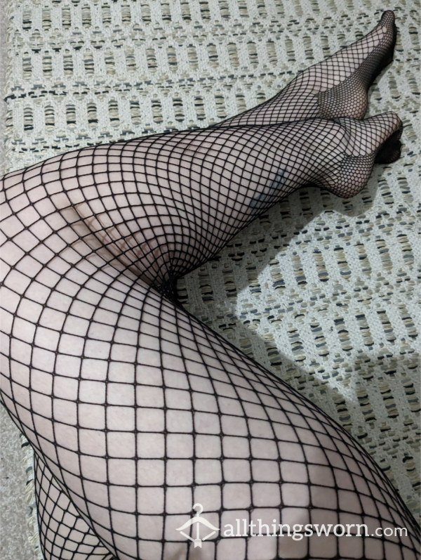 Worn Black Fishnets