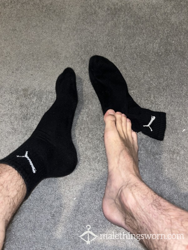 Worn Black Puma Socks