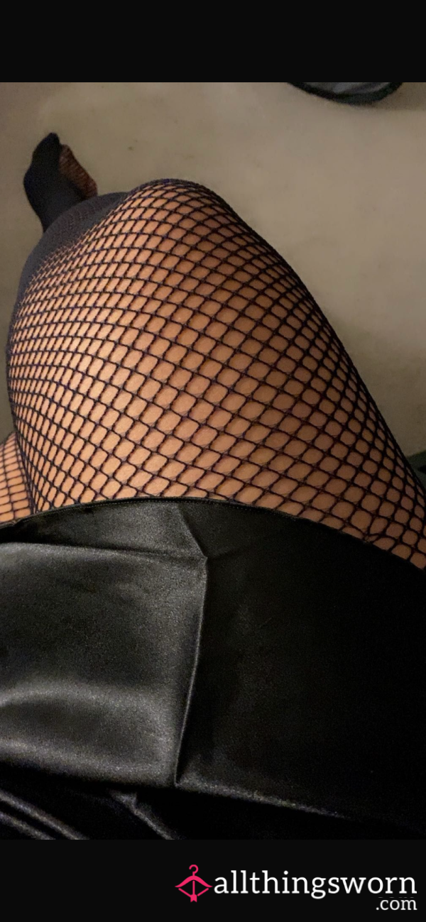 Worn Fishnet Tights