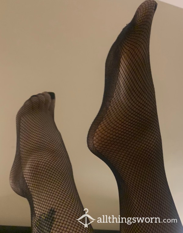 Worn Fishnet Tights