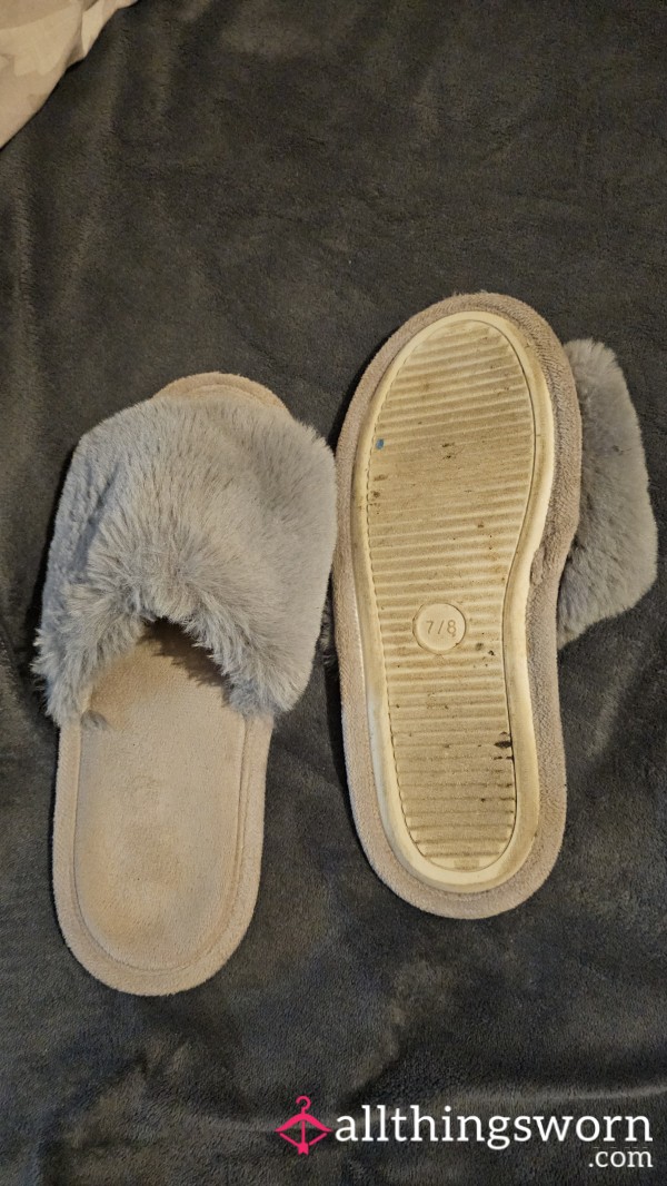 Worn Fluffy Slippers