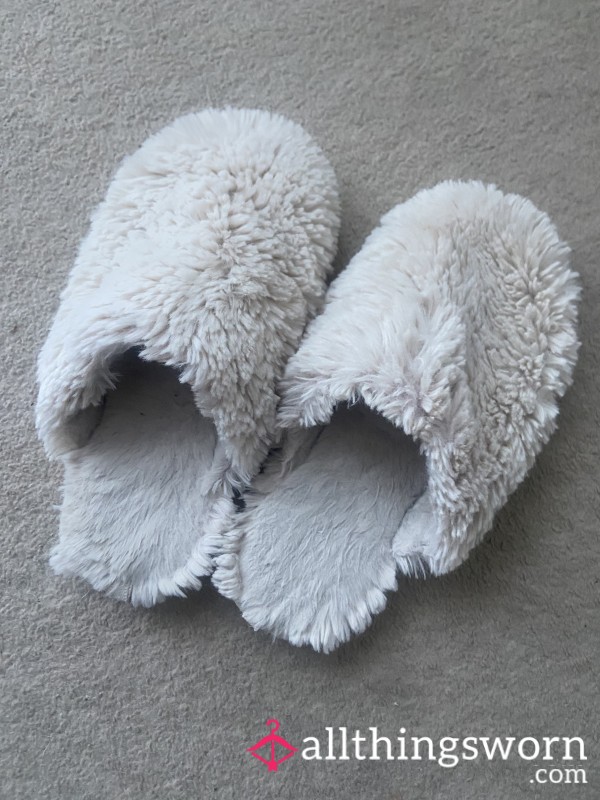 Worn Fluffy White Slippers