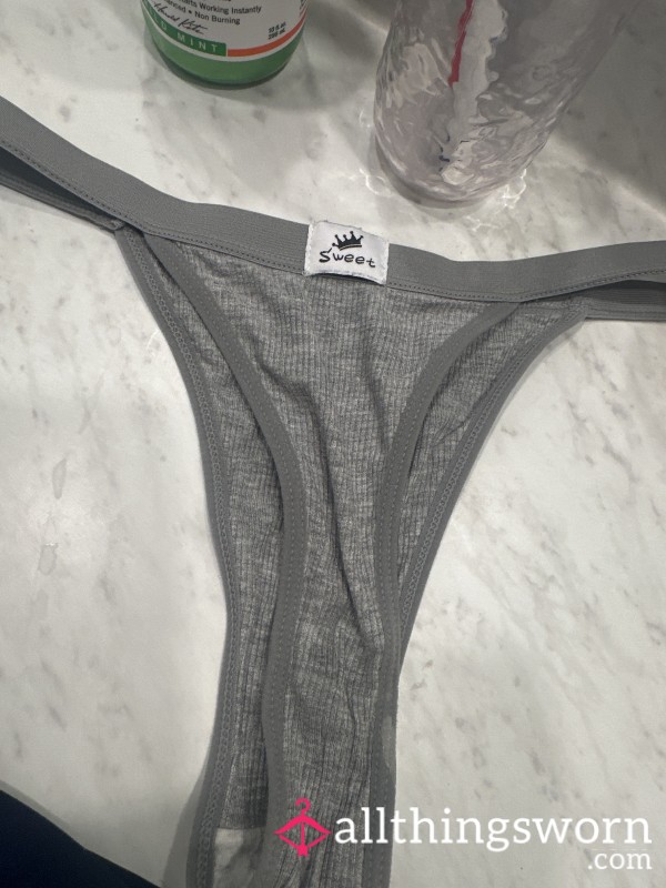 Worn Grey Thongs