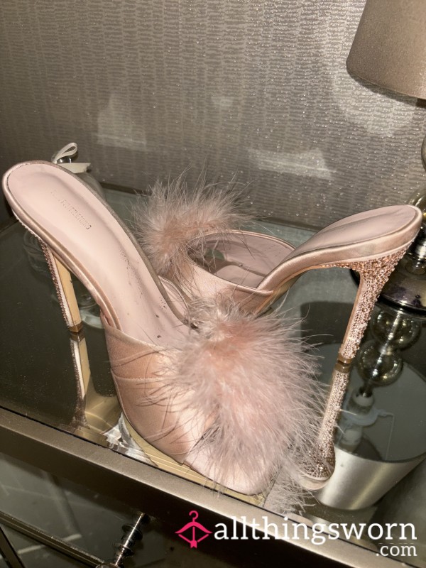 Worn Pink Fluffy Heels